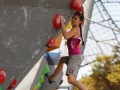 Munich, Germany â August 23: Sabine Bacher (AUT) is seen during the Womens Semi-Finals of the 2014 IFSC Climbing World Championships Bouldering. Bouldering is climbing without the need for ropes or harnesses on typically short, challenging routes. The World Championships are held under the rooftop of the famous Munich Olympic Stadium. Built for the 1972 Olympic Summer Games the architecture was considered revolutionary for its time. The roof, made of large sweeping canopies of acrylic glass stabilized by steel cables should symbolize the Alps.  (Photo Marco Kost / DAV)