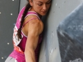 Munich, Germany â August 23: Sabine Bacher (AUT) is seen during the Womens Semi-Finals of the 2014 IFSC Climbing World Championships Bouldering. Bouldering is climbing without the need for ropes or harnesses on typically short, challenging routes. The World Championships are held under the rooftop of the famous Munich Olympic Stadium. Built for the 1972 Olympic Summer Games the architecture was considered revolutionary for its time. The roof, made of large sweeping canopies of acrylic glass stabilized by steel cables should symbolize the Alps.  (Photo Marco Kost / DAV)