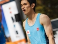 Munich, Germany â August 23: Tsukuru Hori (JPN)  is seen during the Womens Semi-Finals of the 2014 IFSC Climbing World Championships Bouldering. Bouldering is climbing without the need for ropes or harnesses on typically short, challenging routes. The World Championships are held under the rooftop of the famous Munich Olympic Stadium. Built for the 1972 Olympic Summer Games the architecture was considered revolutionary for its time. The roof, made of large sweeping canopies of acrylic glass stabilized by steel cables should symbolize the Alps.  (Photo Marco Kost / DAV)