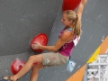 Munich, Germany â August 23: Katharina Saurwein (AUT) is seen during the Womens Semi-Finals of the 2014 IFSC Climbing World Championships Bouldering. Bouldering is climbing without the need for ropes or harnesses on typically short, challenging routes. The World Championships are held under the rooftop of the famous Munich Olympic Stadium. Built for the 1972 Olympic Summer Games the architecture was considered revolutionary for its time. The roof, made of large sweeping canopies of acrylic glass stabilized by steel cables should symbolize the Alps.  (Photo Marco Kost / DAV)