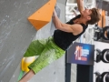Mathias Conrad (GER) is seen during the Mens Semi-Finals of the 2014 IFSC Climbing World Championships Bouldering. Bouldering is climbing without the need for ropes or harnesses on typically short, challenging routes. The World Championships are held under the rooftop of the famous Munich Olympic Stadium. Built for the 1972 Olympic Summer Games the architecture was considered revolutionary for its time. The roof, made of large sweeping canopies of acrylic glass stabilized by steel cables should symbolize the Alps.  (Photo Marco Kost / DAV)
