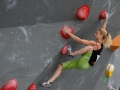 Munich, Germany â August 23: Monika Retschy (GER)  is seen during the Womens Semi-Finals of the 2014 IFSC Climbing World Championships Bouldering. Bouldering is climbing without the need for ropes or harnesses on typically short, challenging routes. The World Championships are held under the rooftop of the famous Munich Olympic Stadium. Built for the 1972 Olympic Summer Games the architecture was considered revolutionary for its time. The roof, made of large sweeping canopies of acrylic glass stabilized by steel cables should symbolize the Alps.  (Photo Marco Kost / DAV)