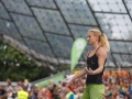 Munich, Germany â August 23: Monika Retschy (GER)  is seen during the Womens Semi-Finals of the 2014 IFSC Climbing World Championships Bouldering. Bouldering is climbing without the need for ropes or harnesses on typically short, challenging routes. The World Championships are held under the rooftop of the famous Munich Olympic Stadium. Built for the 1972 Olympic Summer Games the architecture was considered revolutionary for its time. The roof, made of large sweeping canopies of acrylic glass stabilized by steel cables should symbolize the Alps.  (Photo Marco Kost / DAV)