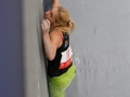 Munich, Germany â August 23: Monika Retschy (GER)  is seen during the Womens Semi-Finals of the 2014 IFSC Climbing World Championships Bouldering. Bouldering is climbing without the need for ropes or harnesses on typically short, challenging routes. The World Championships are held under the rooftop of the famous Munich Olympic Stadium. Built for the 1972 Olympic Summer Games the architecture was considered revolutionary for its time. The roof, made of large sweeping canopies of acrylic glass stabilized by steel cables should symbolize the Alps.  (Photo Marco Kost / DAV)