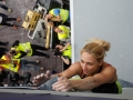 Munich, Germany â August 23: Monika Retschy (GER)  is seen during the Womens Semi-Finals of the 2014 IFSC Climbing World Championships Bouldering. Bouldering is climbing without the need for ropes or harnesses on typically short, challenging routes. The World Championships are held under the rooftop of the famous Munich Olympic Stadium. Built for the 1972 Olympic Summer Games the architecture was considered revolutionary for its time. The roof, made of large sweeping canopies of acrylic glass stabilized by steel cables should symbolize the Alps.  (Photo Marco Kost / DAV)