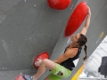 Munich, Germany â August 23: Juliane Wum (GER) is seen during the Womens Semi-Finals of the 2014 IFSC Climbing World Championships Bouldering. Bouldering is climbing without the need for ropes or harnesses on typically short, challenging routes. The World Championships are held under the rooftop of the famous Munich Olympic Stadium. Built for the 1972 Olympic Summer Games the architecture was considered revolutionary for its time. The roof, made of large sweeping canopies of acrylic glass stabilized by steel cables should symbolize the Alps.  (Photo Marco Kost / DAV)