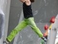 Munich, Germany â August 23: Thomas Tauporn (GER) is seen during the Mens Semi-Finals of the 2014 IFSC Climbing World Championships Bouldering. Bouldering is climbing without the need for ropes or harnesses on typically short, challenging routes. The World Championships are held under the rooftop of the famous Munich Olympic Stadium. Built for the 1972 Olympic Summer Games the architecture was considered revolutionary for its time. The roof, made of large sweeping canopies of acrylic glass stabilized by steel cables should symbolize the Alps.  (Photo Marco Kost / DAV)