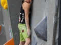 Munich, Germany â August 23: Juliane Wum (GER) is seen during the Womens Semi-Finals of the 2014 IFSC Climbing World Championships Bouldering. Bouldering is climbing without the need for ropes or harnesses on typically short, challenging routes. The World Championships are held under the rooftop of the famous Munich Olympic Stadium. Built for the 1972 Olympic Summer Games the architecture was considered revolutionary for its time. The roof, made of large sweeping canopies of acrylic glass stabilized by steel cables should symbolize the Alps.  (Photo Marco Kost / DAV)