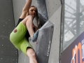 Munich, Germany â August 23: Juliane Wum (GER) is seen during the Womens Semi-Finals of the 2014 IFSC Climbing World Championships Bouldering. Bouldering is climbing without the need for ropes or harnesses on typically short, challenging routes. The World Championships are held under the rooftop of the famous Munich Olympic Stadium. Built for the 1972 Olympic Summer Games the architecture was considered revolutionary for its time. The roof, made of large sweeping canopies of acrylic glass stabilized by steel cables should symbolize the Alps.  (Photo Marco Kost / DAV)