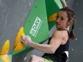Munich, Germany â August 23: Juliane Wum (GER) is seen during the Womens Semi-Finals of the 2014 IFSC Climbing World Championships Bouldering. Bouldering is climbing without the need for ropes or harnesses on typically short, challenging routes. The World Championships are held under the rooftop of the famous Munich Olympic Stadium. Built for the 1972 Olympic Summer Games the architecture was considered revolutionary for its time. The roof, made of large sweeping canopies of acrylic glass stabilized by steel cables should symbolize the Alps.  (Photo Marco Kost / DAV)