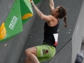 Munich, Germany â August 23: Juliane Wum (GER) is seen during the Womens Semi-Finals of the 2014 IFSC Climbing World Championships Bouldering. Bouldering is climbing without the need for ropes or harnesses on typically short, challenging routes. The World Championships are held under the rooftop of the famous Munich Olympic Stadium. Built for the 1972 Olympic Summer Games the architecture was considered revolutionary for its time. The roof, made of large sweeping canopies of acrylic glass stabilized by steel cables should symbolize the Alps.  (Photo Marco Kost / DAV)