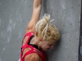 Munich, Germany â August 23: Michaela Tracy (GBR) is seen during the Womens Semi-Finals of the 2014 IFSC Climbing World Championships Bouldering. Bouldering is climbing without the need for ropes or harnesses on typically short, challenging routes. The World Championships are held under the rooftop of the famous Munich Olympic Stadium. Built for the 1972 Olympic Summer Games the architecture was considered revolutionary for its time. The roof, made of large sweeping canopies of acrylic glass stabilized by steel cables should symbolize the Alps.  (Photo Marco Kost / DAV)