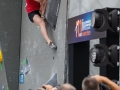 Munich, Germany â August 23: Michaela Tracy (GBR) is seen during the Womens Semi-Finals of the 2014 IFSC Climbing World Championships Bouldering. Bouldering is climbing without the need for ropes or harnesses on typically short, challenging routes. The World Championships are held under the rooftop of the famous Munich Olympic Stadium. Built for the 1972 Olympic Summer Games the architecture was considered revolutionary for its time. The roof, made of large sweeping canopies of acrylic glass stabilized by steel cables should symbolize the Alps.  (Photo Marco Kost / DAV)