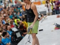 Munich, Germany â August 23: Juliane Wum (GER) is seen during the Womens Semi-Finals of the 2014 IFSC Climbing World Championships Bouldering. Bouldering is climbing without the need for ropes or harnesses on typically short, challenging routes. The World Championships are held under the rooftop of the famous Munich Olympic Stadium. Built for the 1972 Olympic Summer Games the architecture was considered revolutionary for its time. The roof, made of large sweeping canopies of acrylic glass stabilized by steel cables should symbolize the Alps.  (Photo Marco Kost / DAV)