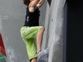 Munich, Germany â August 23: Jan Hojer (GER) is seen during the Mens Semi-Finals of the 2014 IFSC Climbing World Championships Bouldering. Bouldering is climbing without the need for ropes or harnesses on typically short, challenging routes. The World Championships are held under the rooftop of the famous Munich Olympic Stadium. Built for the 1972 Olympic Summer Games the architecture was considered revolutionary for its time. The roof, made of large sweeping canopies of acrylic glass stabilized by steel cables should symbolize the Alps.  (Photo Marco Kost / DAV)