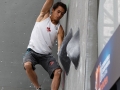 Munich, Germany â August 23: Sean McColl (CAN) is seen during the Mens Semi-Finals of the 2014 IFSC Climbing World Championships Bouldering. Bouldering is climbing without the need for ropes or harnesses on typically short, challenging routes. The World Championships are held under the rooftop of the famous Munich Olympic Stadium. Built for the 1972 Olympic Summer Games the architecture was considered revolutionary for its time. The roof, made of large sweeping canopies of acrylic glass stabilized by steel cables should symbolize the Alps.  (Photo Marco Kost / DAV)