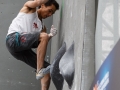 Munich, Germany â August 23: Sean McColl (CAN) is seen during the Mens Semi-Finals of the 2014 IFSC Climbing World Championships Bouldering. Bouldering is climbing without the need for ropes or harnesses on typically short, challenging routes. The World Championships are held under the rooftop of the famous Munich Olympic Stadium. Built for the 1972 Olympic Summer Games the architecture was considered revolutionary for its time. The roof, made of large sweeping canopies of acrylic glass stabilized by steel cables should symbolize the Alps.  (Photo Marco Kost / DAV)