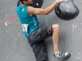 Munich, Germany â August 23: Kilian Fischhuber (ATT) is seen during the Womens Semi-Finals of the 2014 IFSC Climbing World Championships Bouldering. Bouldering is climbing without the need for ropes or harnesses on typically short, challenging routes. The World Championships are held under the rooftop of the famous Munich Olympic Stadium. Built for the 1972 Olympic Summer Games the architecture was considered revolutionary for its time. The roof, made of large sweeping canopies of acrylic glass stabilized by steel cables should symbolize the Alps.  (Photo Marco Kost / DAV)