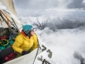 Ines Papert resting in the portaledge 600m above ground on the route Riders on the storm in Torres del Paine (c) Thomas Senf