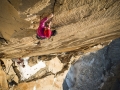 Mayan Smith-Gobat climbing pitch 31 (7c+) in the route riders on the storm, Torres del Paine (c) Thomas Senf